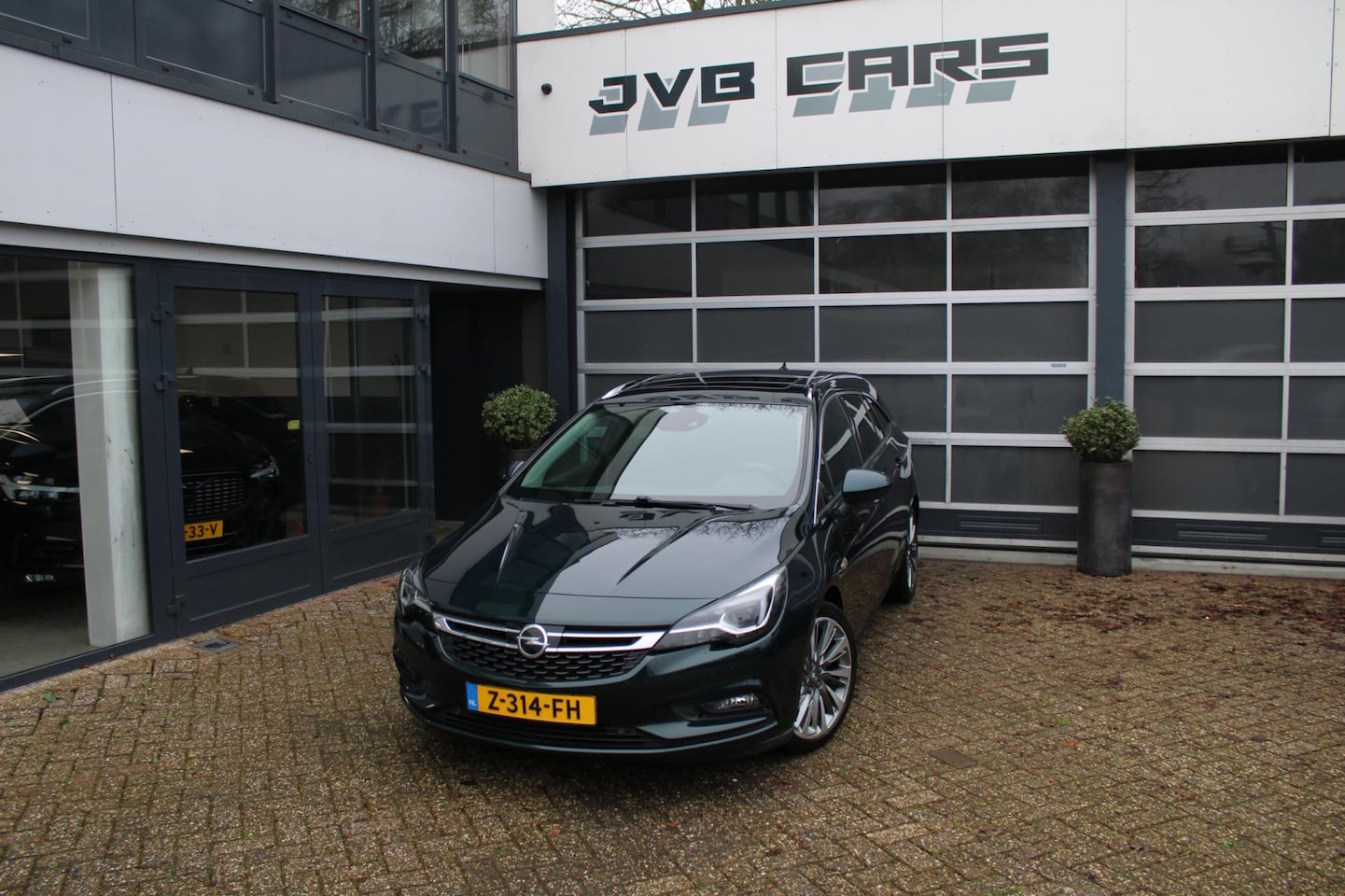 Opel Astra Sports Tourer - 1.4 Turbo Innovation - AutoWereld.nl