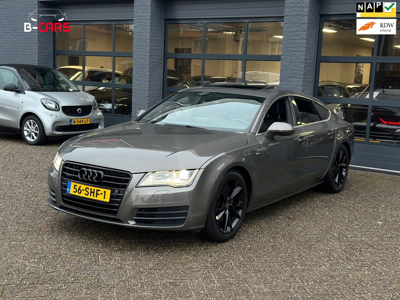 Audi A7 Sportback - 2.8 FSI quattro Pro Plus LEER|STOELVW|NAP|PANO|PDC|CAMERA - AutoWereld.nl