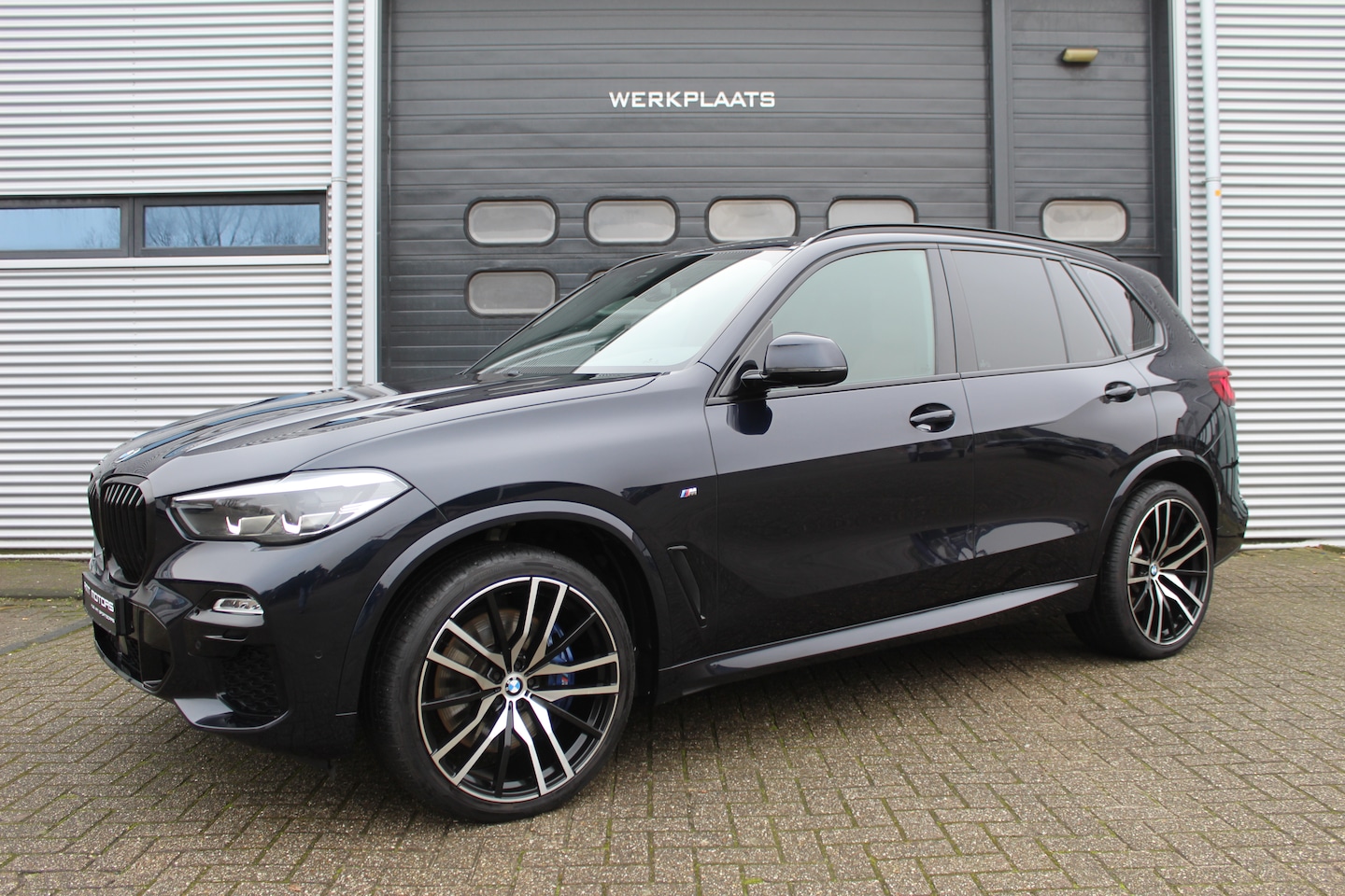 BMW X5 - 4.0i xDrive High Executive M-Sportpakket | 88.066km | NAP | Carbon Black | 22 inch | Autom. - AutoWereld.nl