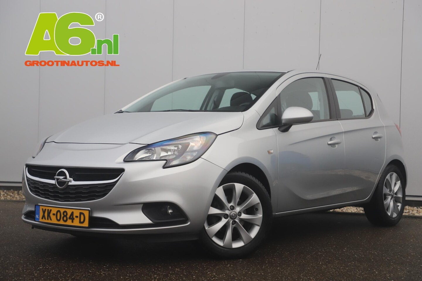 Opel Corsa - 1.4 Favourite 16 inch LMV Navigatie Carplay Android Bluetooth Airco Cruise Parkeersensor - AutoWereld.nl