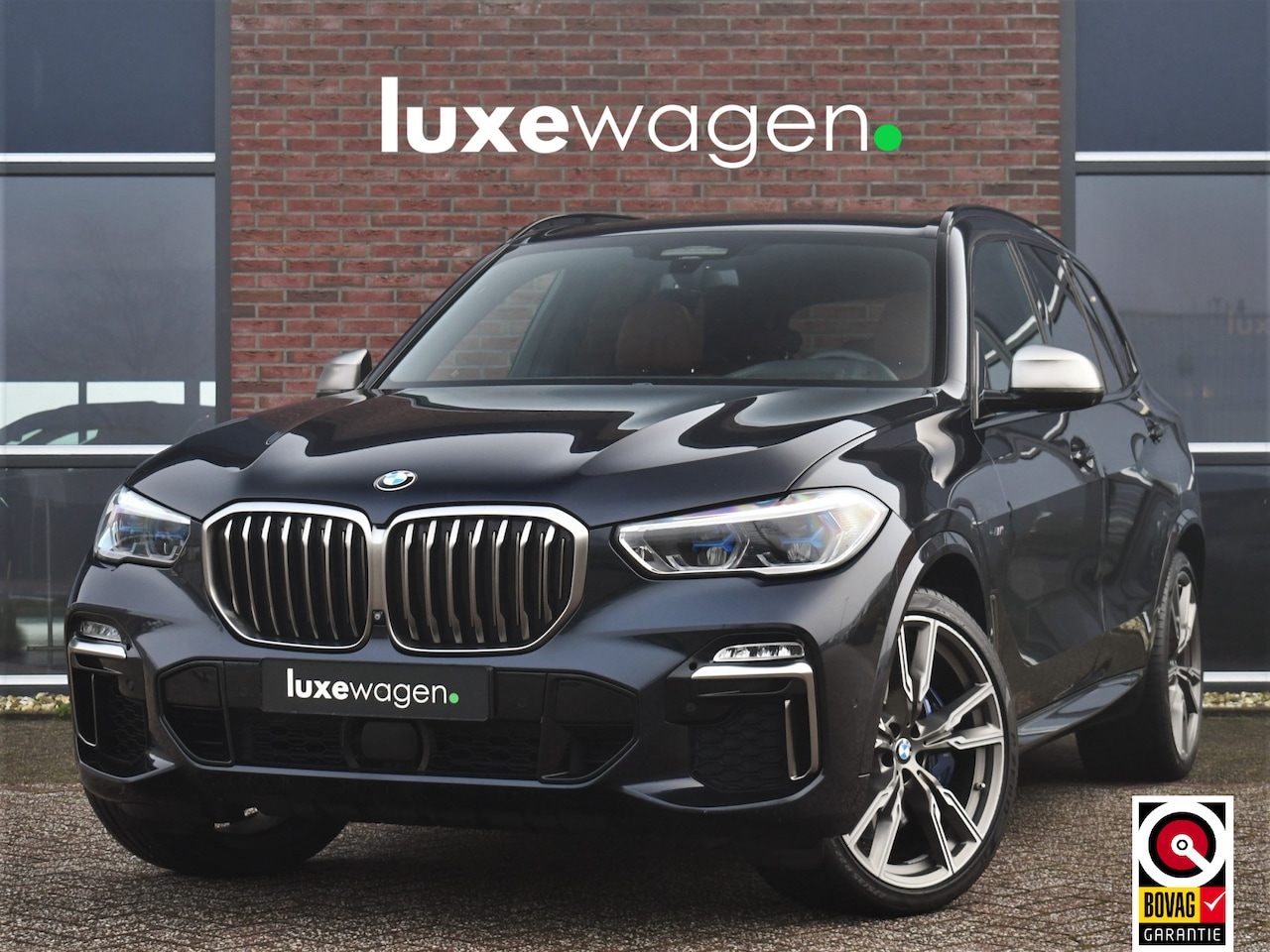 BMW X5 - M50d xDrive 400pk Pano Trekh ACC Massage 360 HUD H/K Adp-M-onderstel 4-wielsturing - AutoWereld.nl