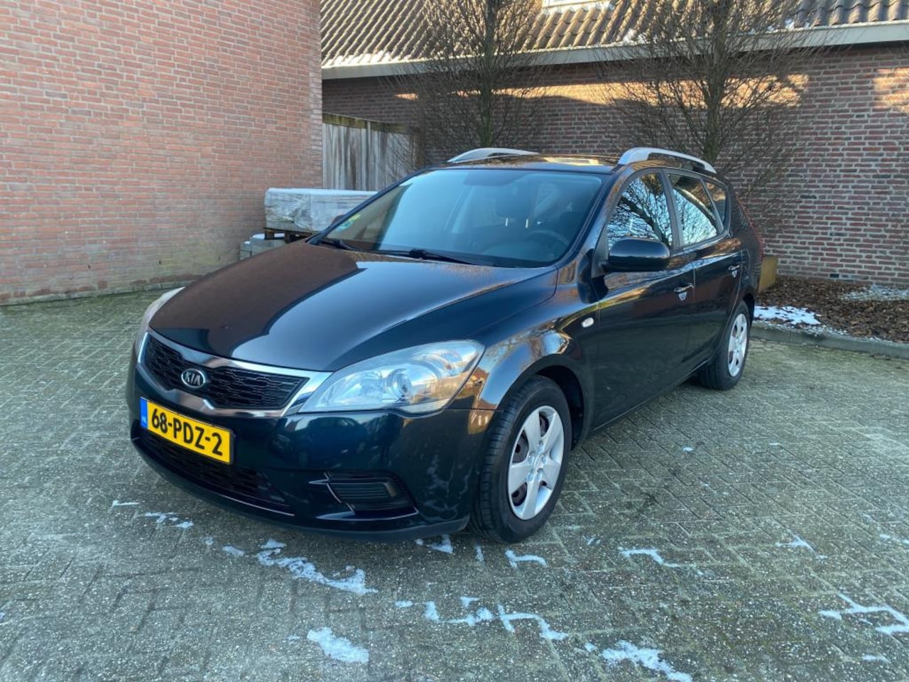 Kia Cee'd Sporty Wagon - 1.4 CVVT X-tra 1.4 CVVT X-tra - AutoWereld.nl