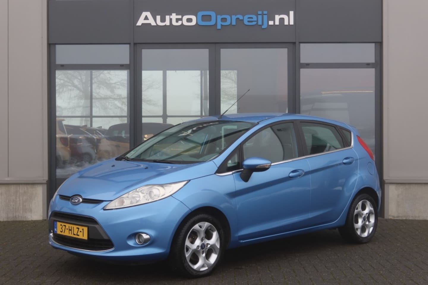 Ford Fiesta - 1.25 Titanium 5drs. Clima, Cruise, PDC, Dealer onderhouden - AutoWereld.nl