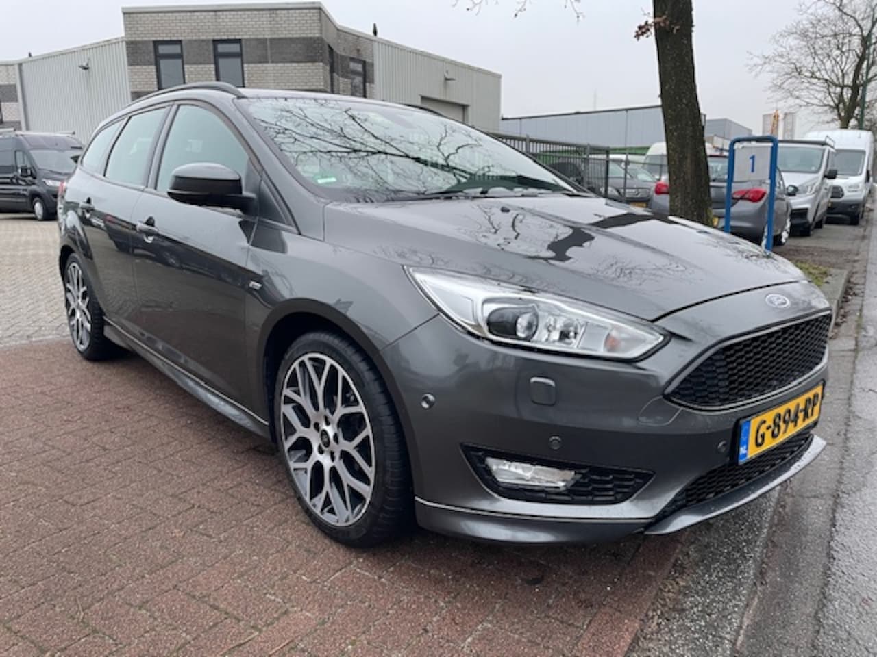 Ford Focus Wagon - 1.0 140pk ST-Line 136.000km Airco/ECC,Navigatie,Camera - AutoWereld.nl