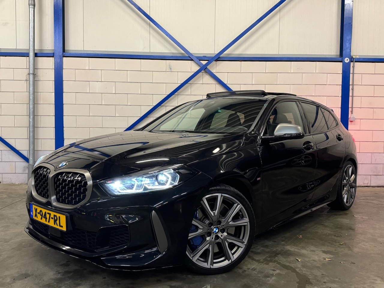 BMW 1-serie - M135i xDrive 306PK HUD|PANO|LEDER|H&K|VOL! - AutoWereld.nl