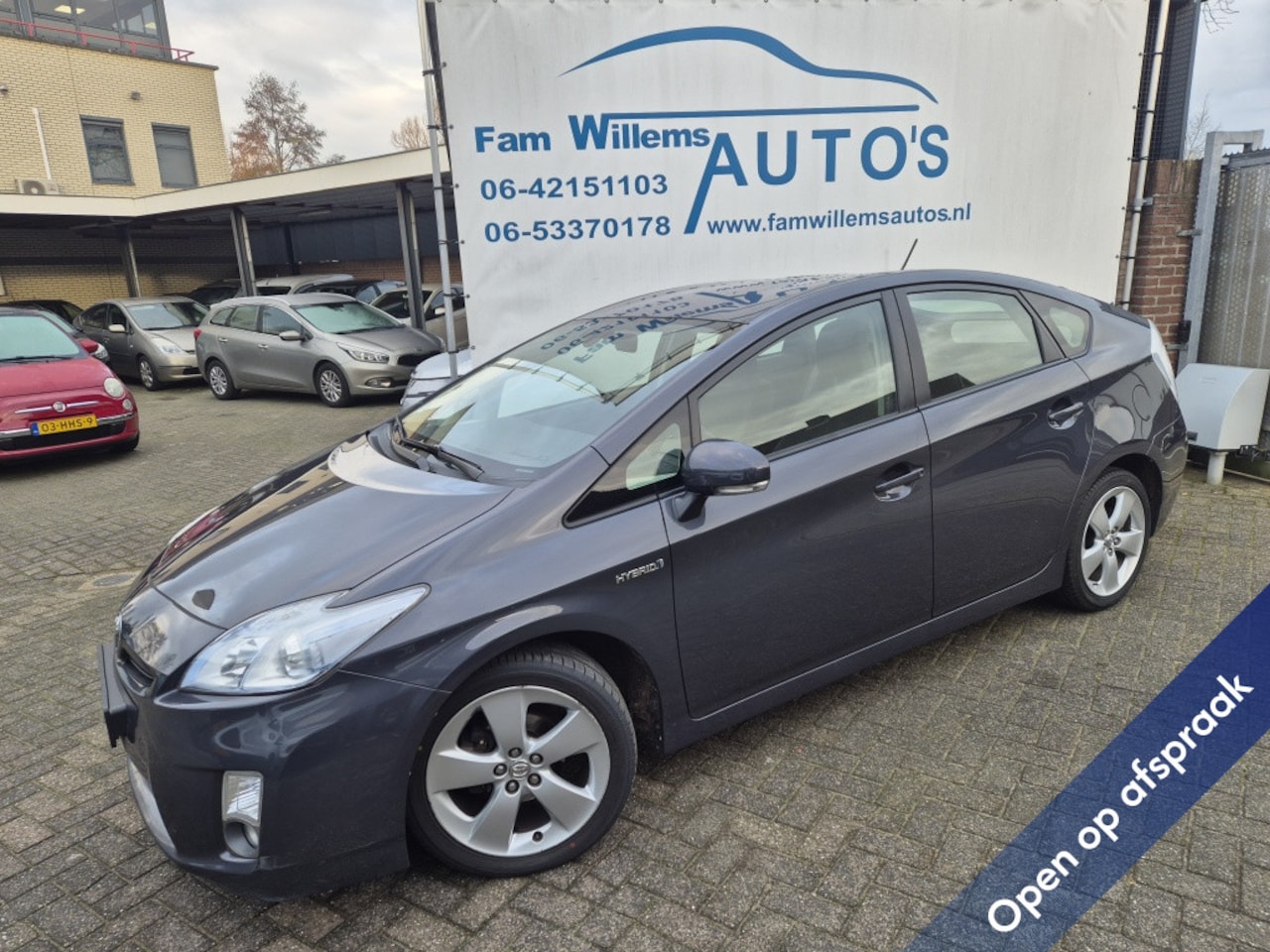 Toyota Prius - 1.8 Clima Navi HUD - AutoWereld.nl