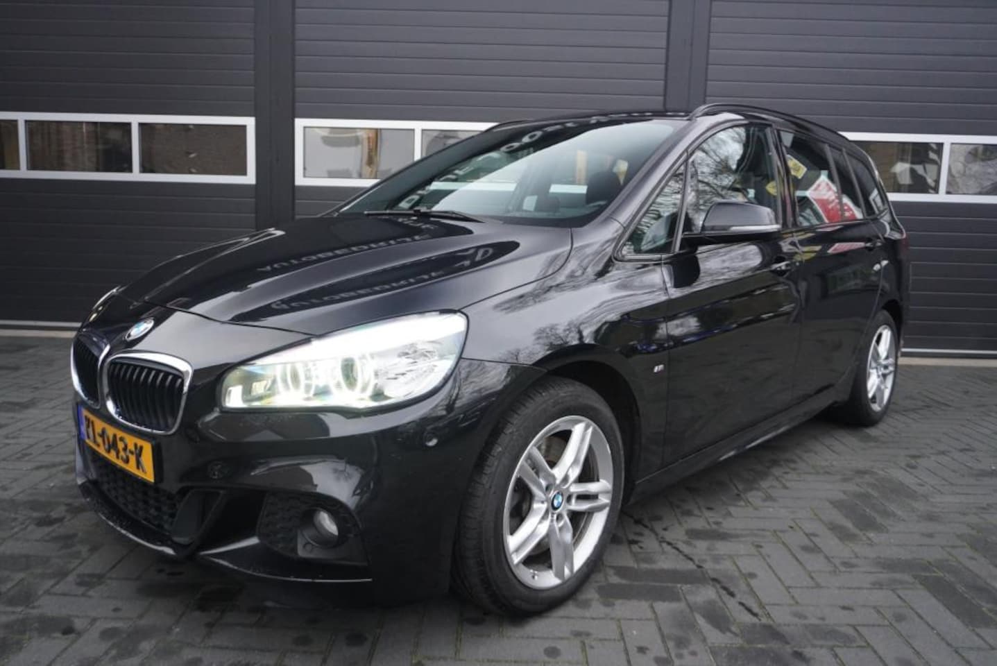 BMW 2-serie Gran Tourer - 220i M Sport Aut/Camera/Airco/CC/Navi/Trekhaak - AutoWereld.nl