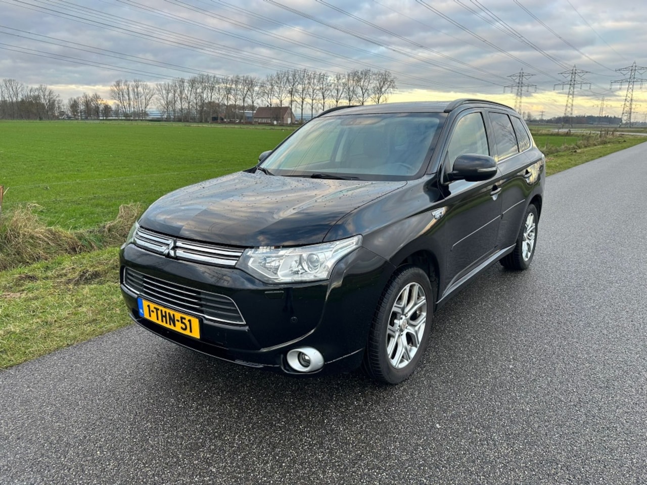 Mitsubishi Outlander - 2.0 PHEV Instyle 1e EIG / PANORAMADAK / LEDER / NAP ! - AutoWereld.nl