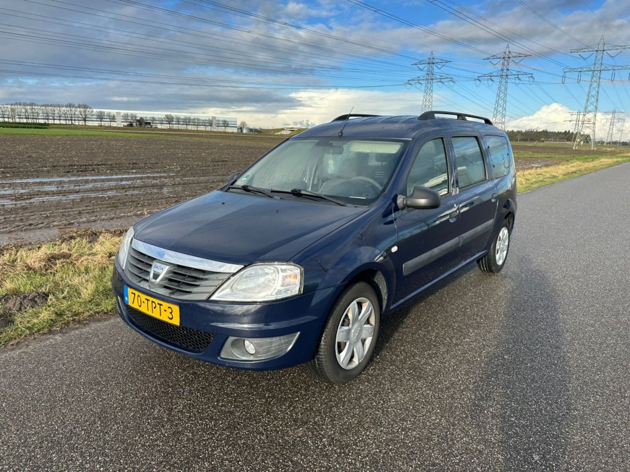 Dacia Logan MCV - 1.6 MPI Aniversare 7 PERSOONS / AIRCO / NAP ! - AutoWereld.nl