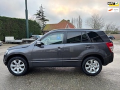 Suzuki Grand Vitara - 2.4 High Executive Aut/ AWD/Schuifdak/Leer/Trekhaak/Navi/PDC