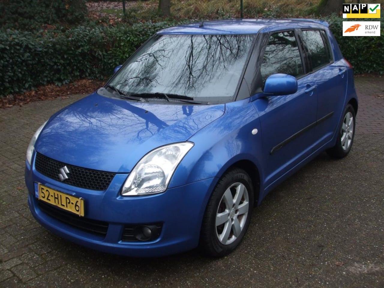 Suzuki Swift - 1.3 Bandit climate 5 drs 142 dkm NAP blauw - AutoWereld.nl