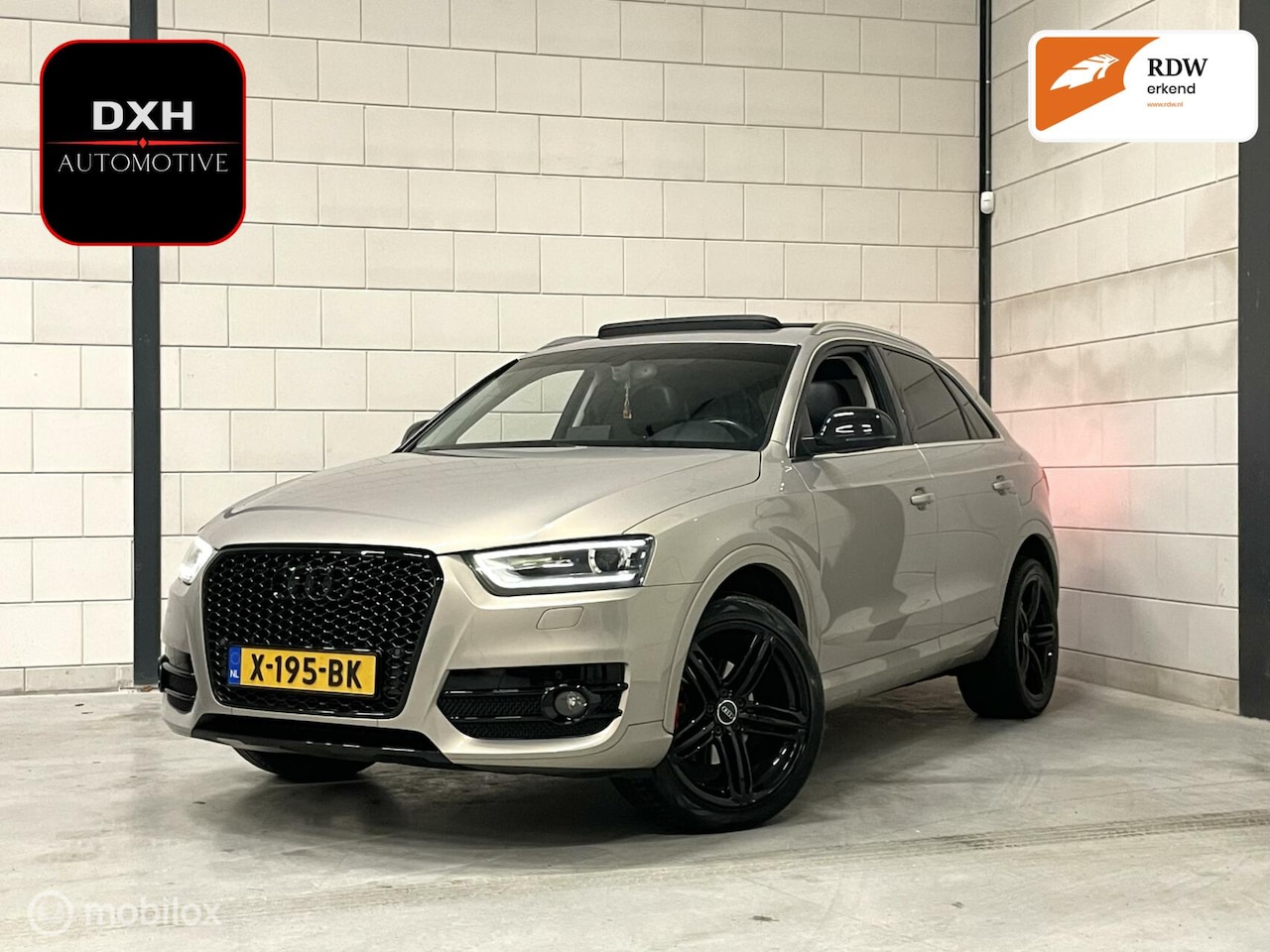 Audi Q3 - 2.0 TFSI Quattro 211pk S-Line PANO NAV STOELV TREKHK - AutoWereld.nl