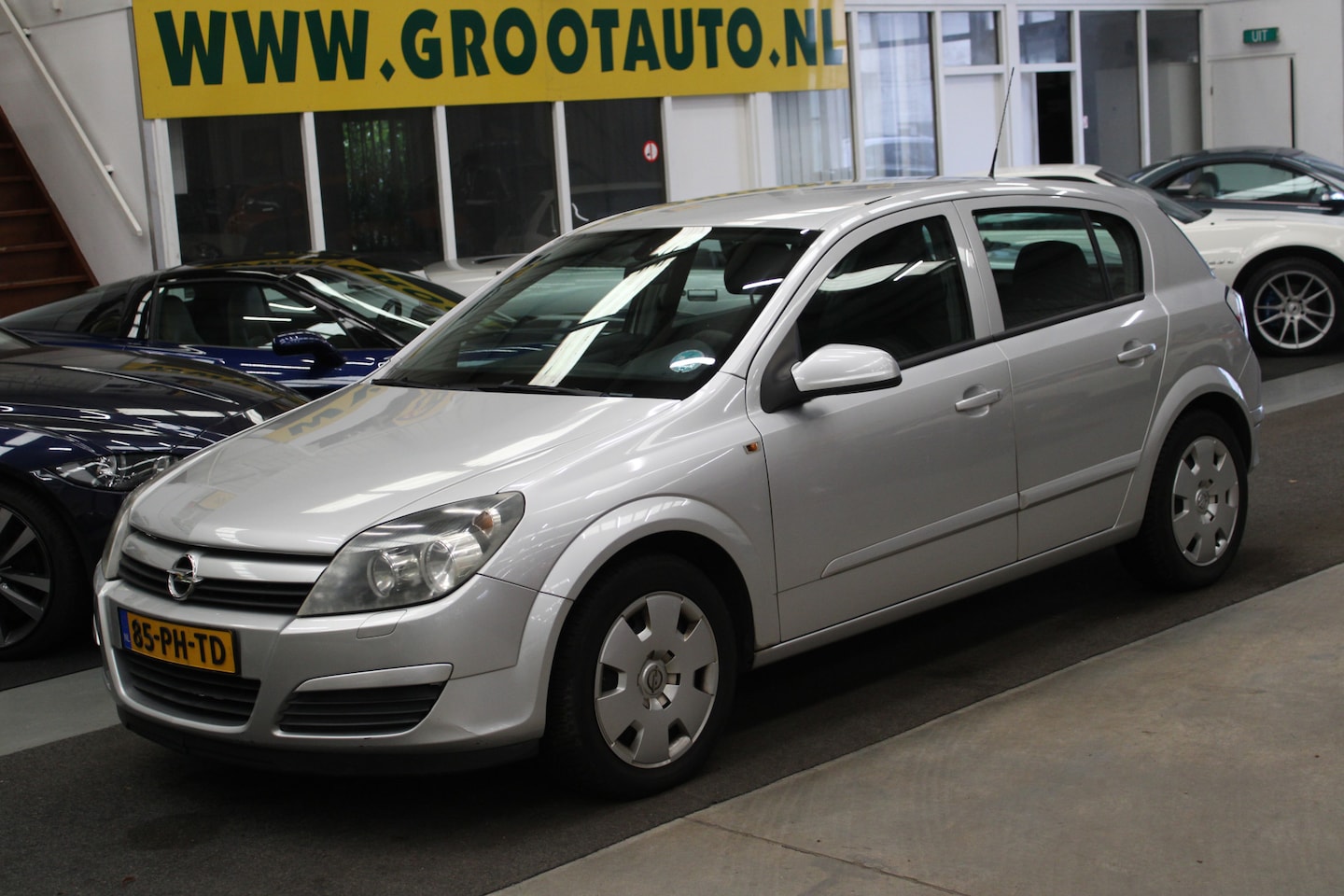 Opel Astra - 1.6 Enjoy Airco, Cruise control, Trekhaak, Stuurbekrachtiging - AutoWereld.nl