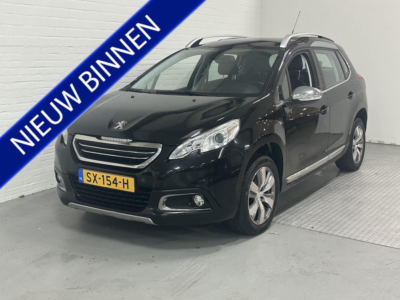 Peugeot 2008 - 1.2 VTi Allure Pack Premium Plus CLIMA / CRUISE / HOGE INSTAP / LMV - AutoWereld.nl