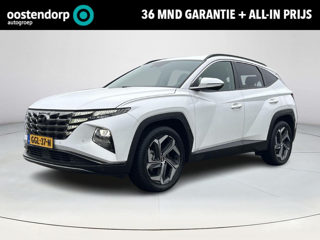 Hyundai Tucson - 1.6 T-GDI HEV Comfort Smart | Cruise Control | Climate Control | Navigatiesysteem | Achter - AutoWereld.nl