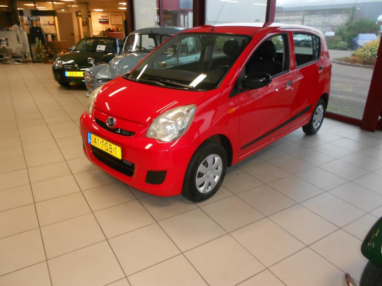 Daihatsu Cuore - 1.0 Clever 1.0 Clever - AutoWereld.nl