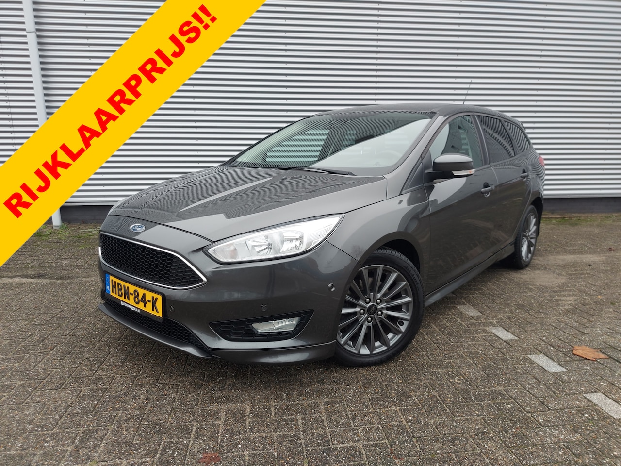 Ford Focus Wagon - 1.5i 110KW Titanium airco,cruise,navigatie,stoel/stuur verwarming,parkeersensoren, - AutoWereld.nl