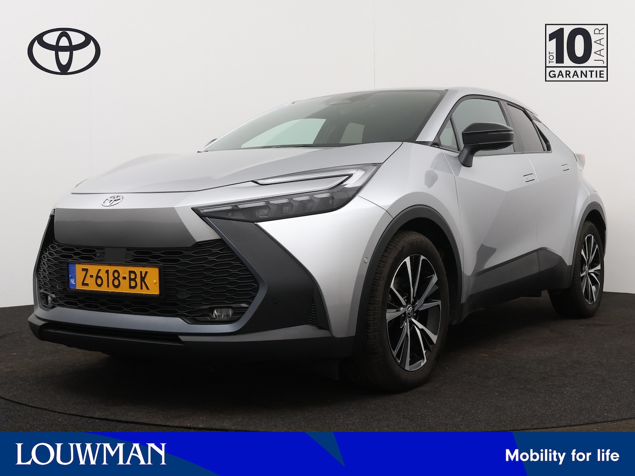 Toyota C-HR - 1.8 Hybrid 140 First Edition | Elektrisch bedienbare achterklep | Draadloze telefoonlader - AutoWereld.nl