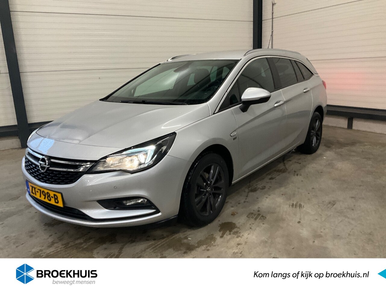 Opel Astra Sports Tourer - 1.0 Turbo 120 Jaar Edition | Climate Control | Navigatie | Cruise Control | Parkeersensore - AutoWereld.nl