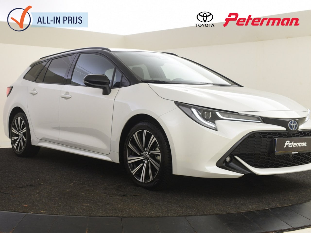 Toyota Corolla Touring Sports - 1.8 Hybrid Bi-Tone Plus | Navi | HUD | Stuur- & stoelverwarming - AutoWereld.nl