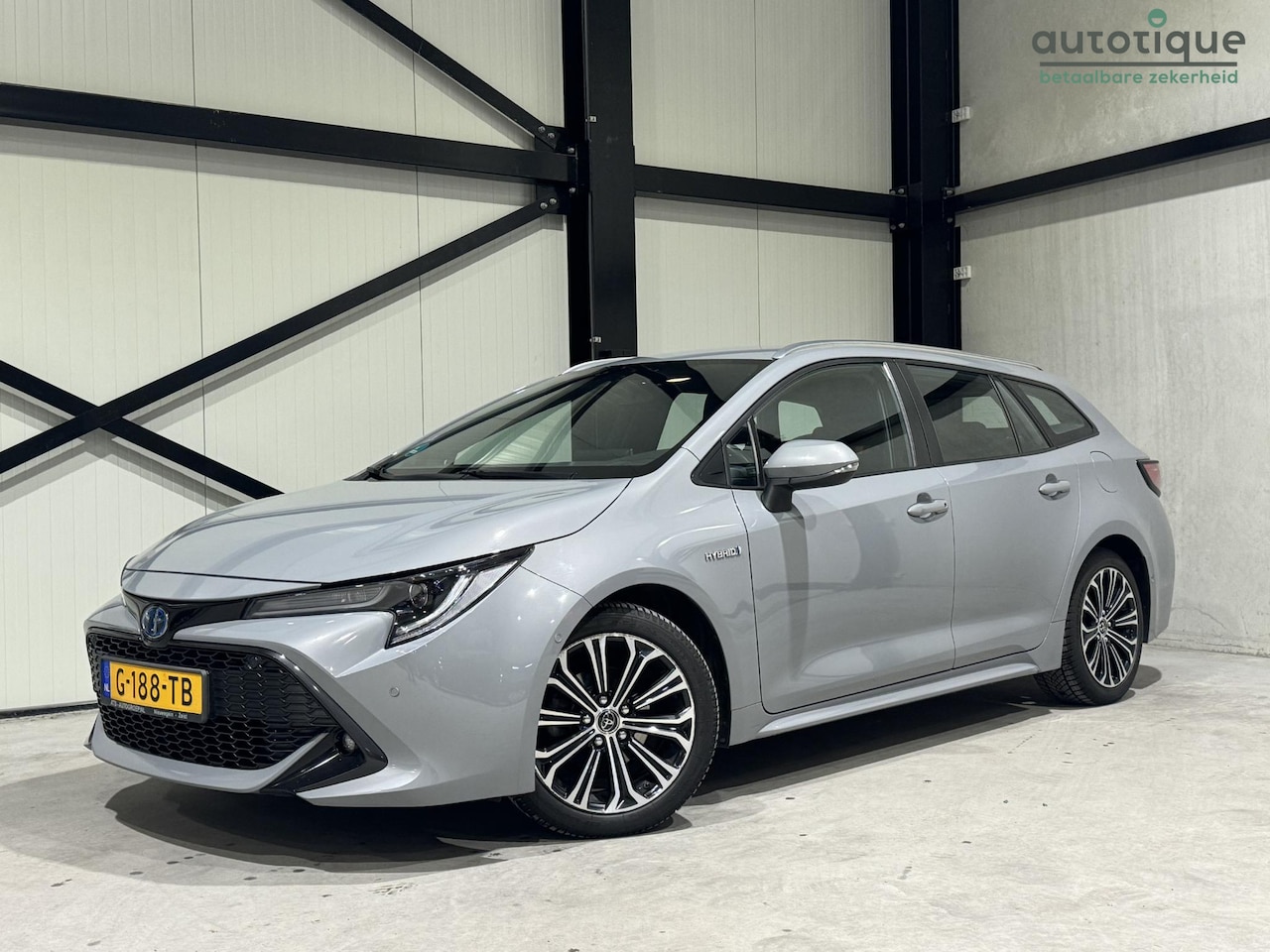 Toyota Corolla Touring Sports - 1.8 Hybrid Style Aut. | navi | camera | stoelverwarming | - AutoWereld.nl