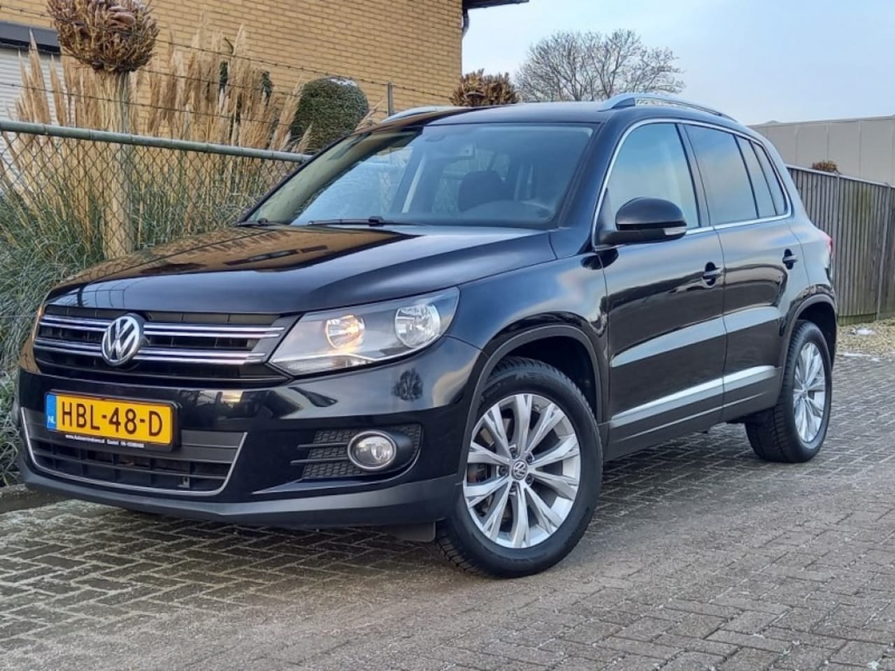 Volkswagen Tiguan - 1.4 TSI Blue Motion Sport en Style/ Automaat - AutoWereld.nl