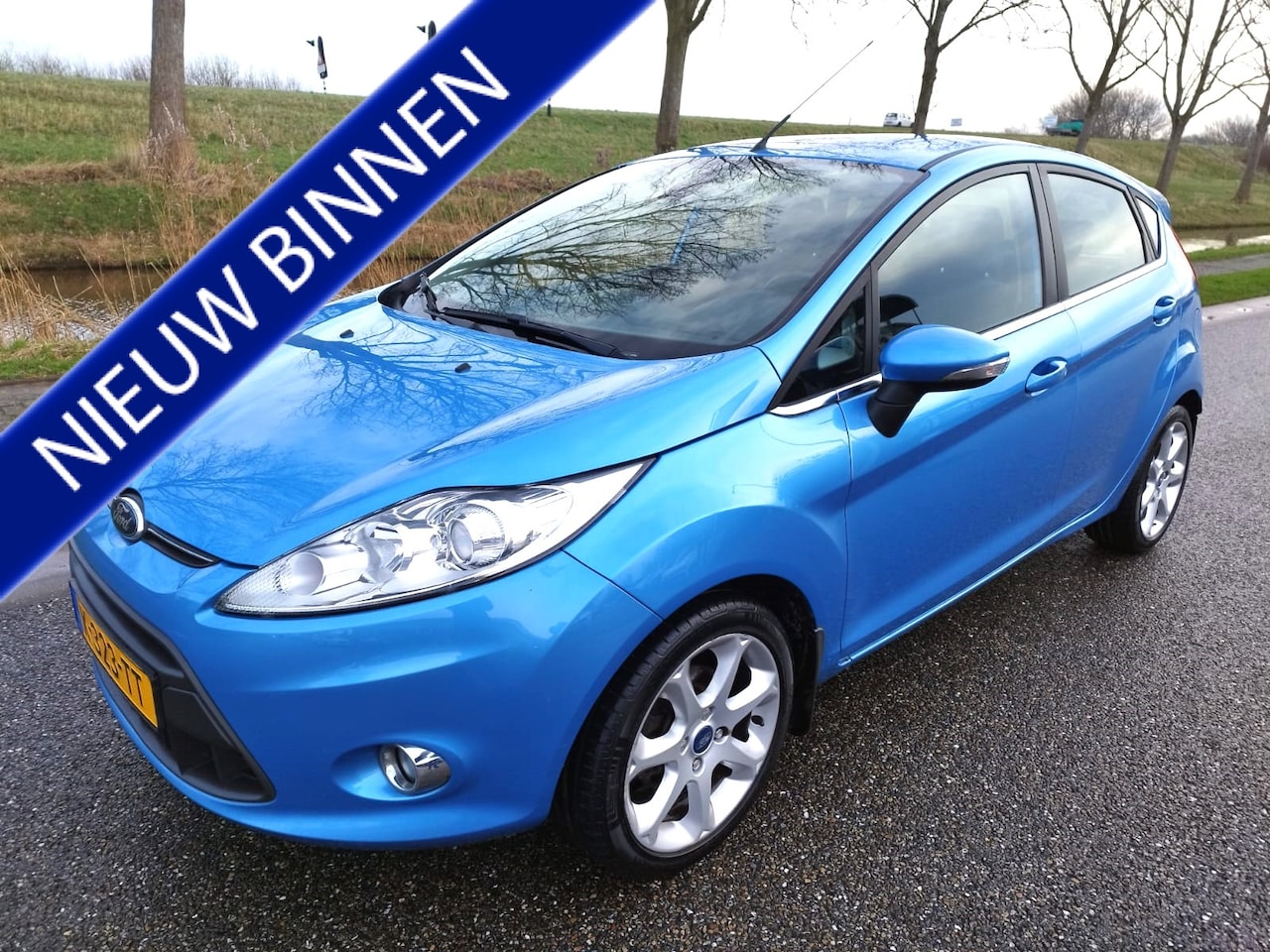 Ford Fiesta - 1.4 Titanium ** Airco ** Bluetooth ** 5 DRS ** Stoelverwarming ** Trekhaak ** - AutoWereld.nl