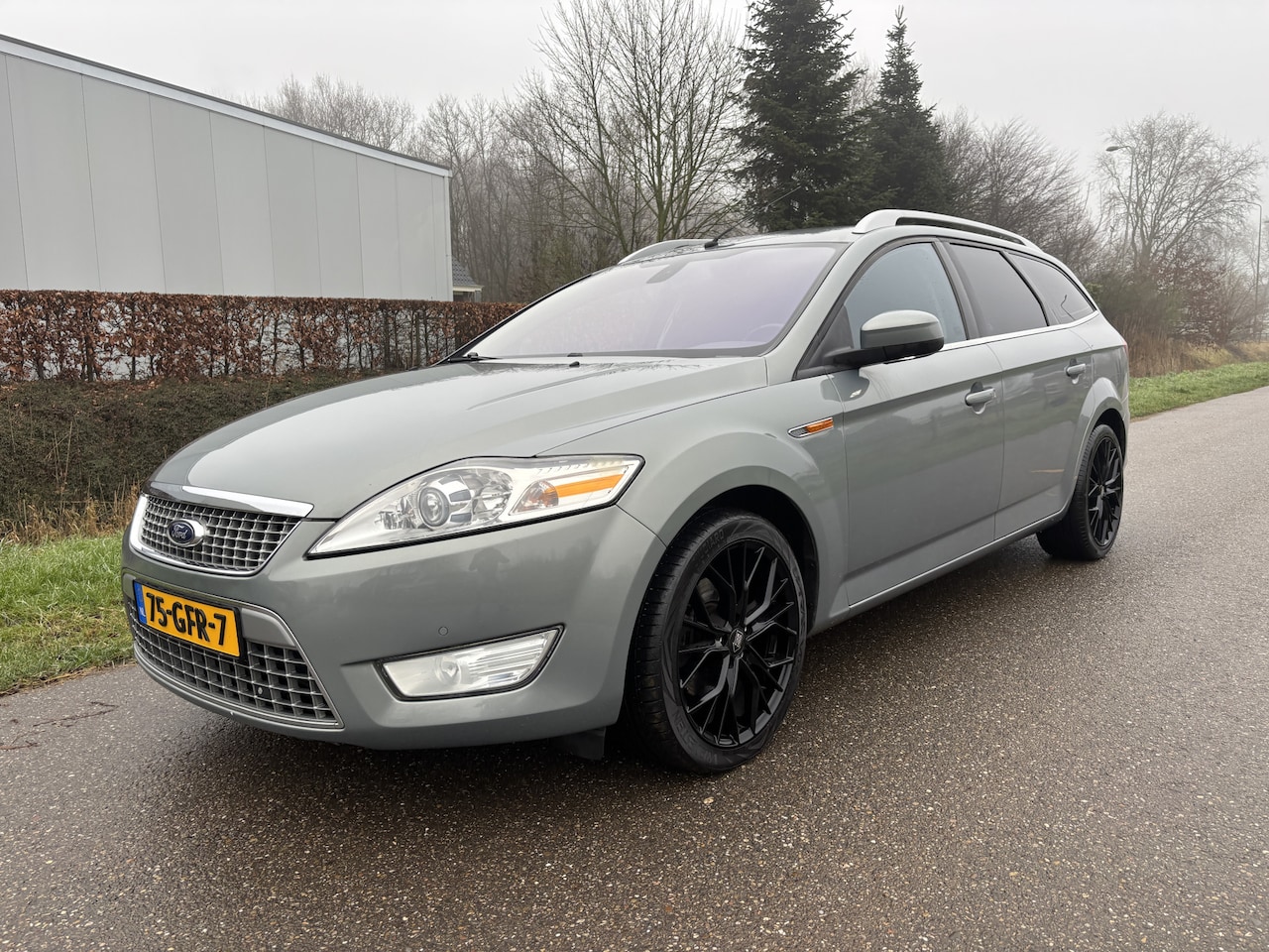 Ford Mondeo Wagon - 2.3-16V Titanium / AUTOMAAT / NAVI / STOELVERWARMING - AutoWereld.nl