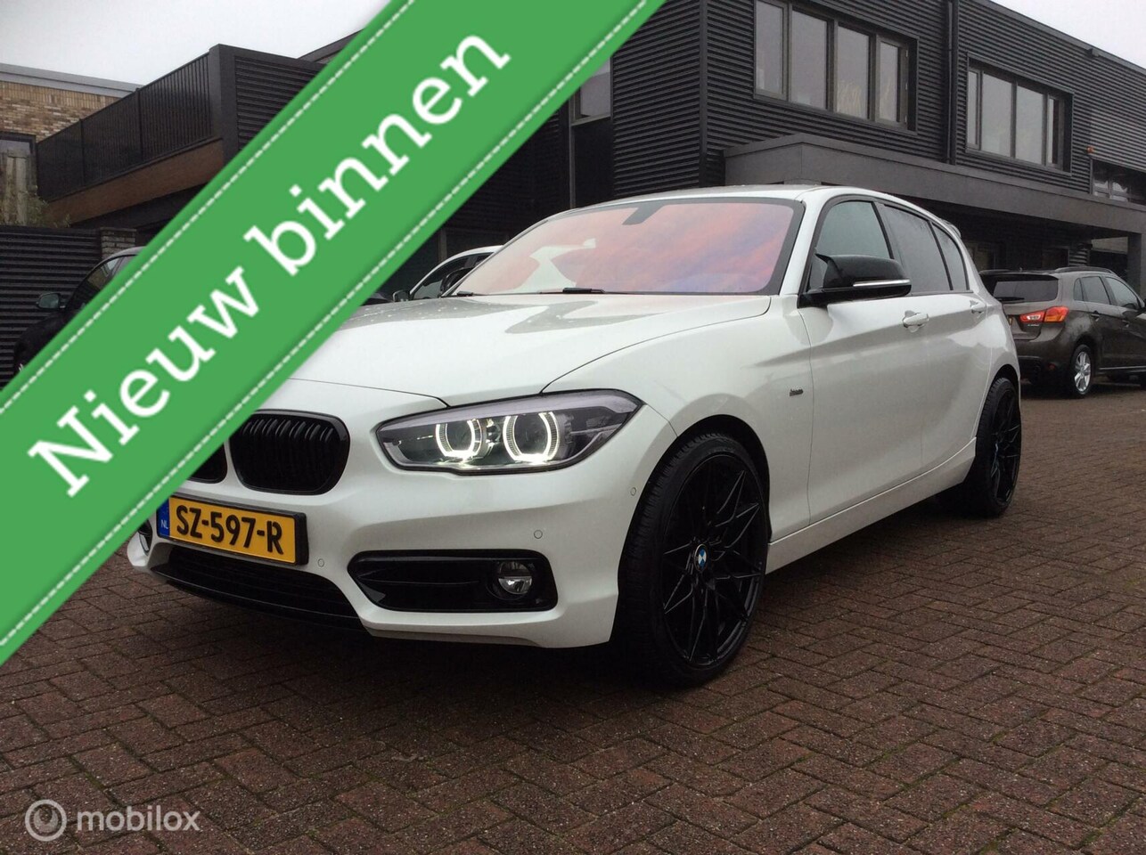 BMW 1-serie - 118d Executive 19"lm vlg Nav Apple Carplay nap leder - AutoWereld.nl