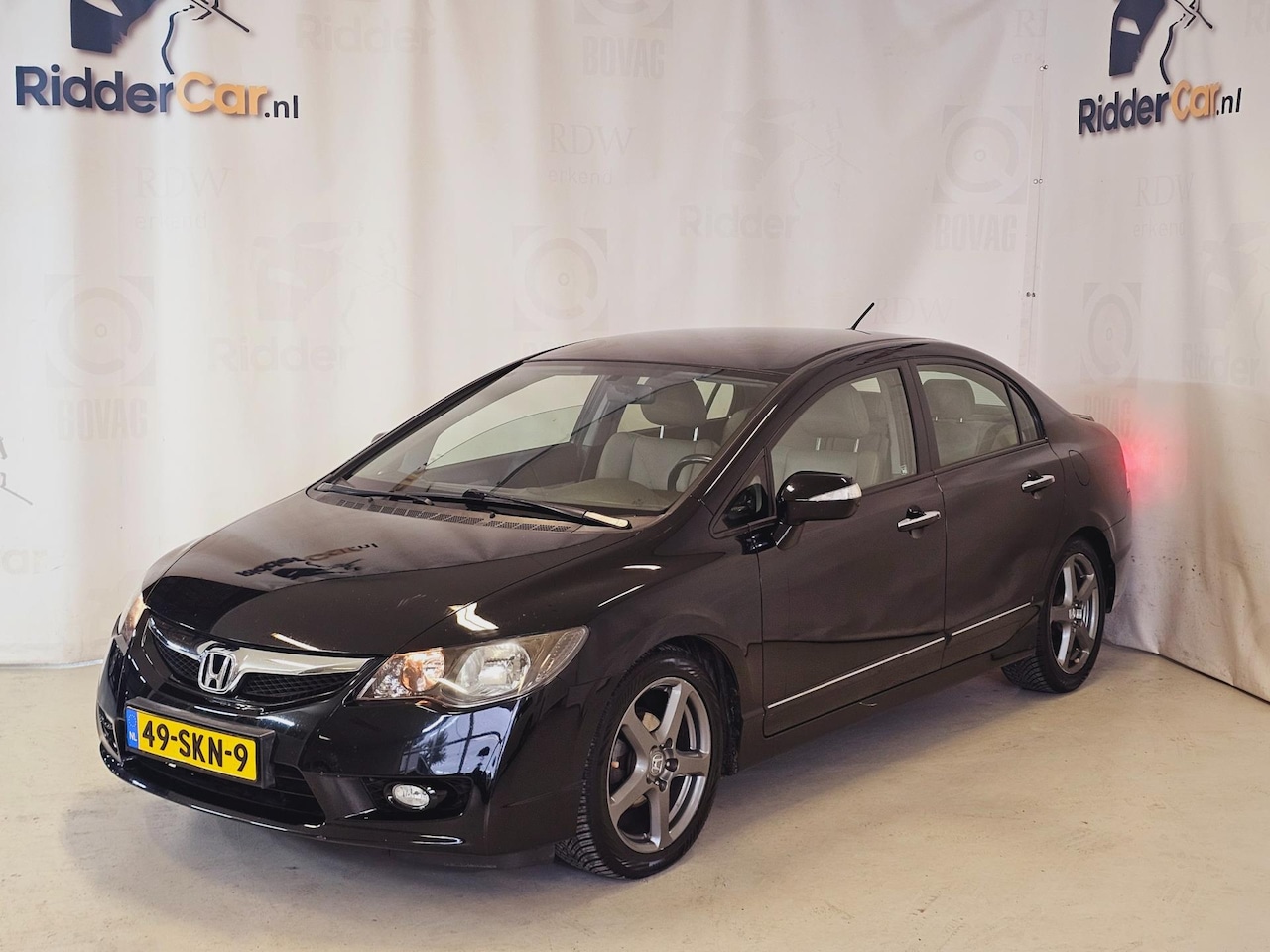 Honda Civic - 1.3 Hybrid Elegance|NAP|AUTOMAAT|LEDER|CRUISE|NAVI|PARK CAM - AutoWereld.nl