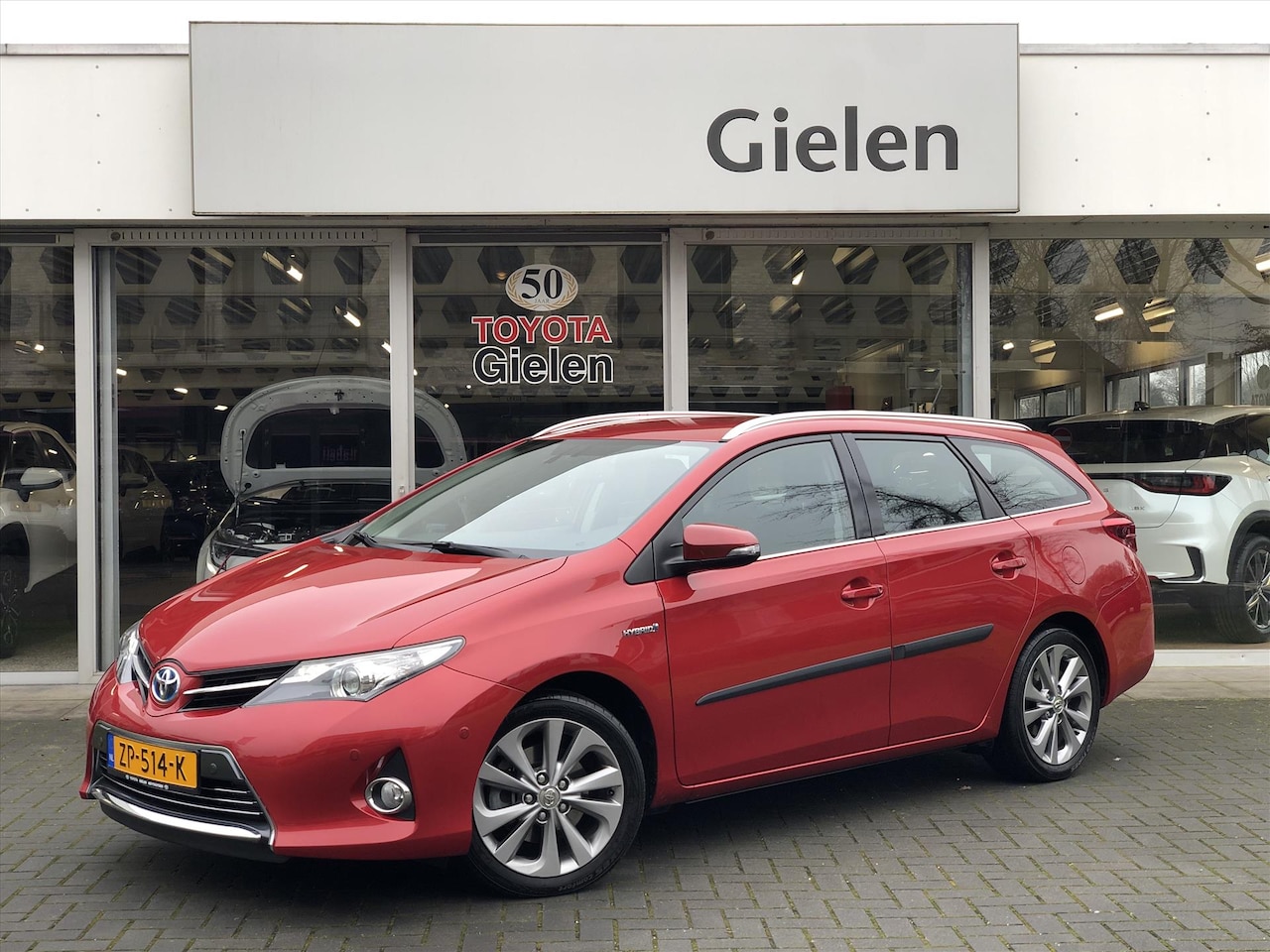 Toyota Auris Touring Sports - 1.8 Hybrid Executive | Navigatie, Parkeersensoren, 17 inch, Half leer, stoelverwarming, Ke - AutoWereld.nl