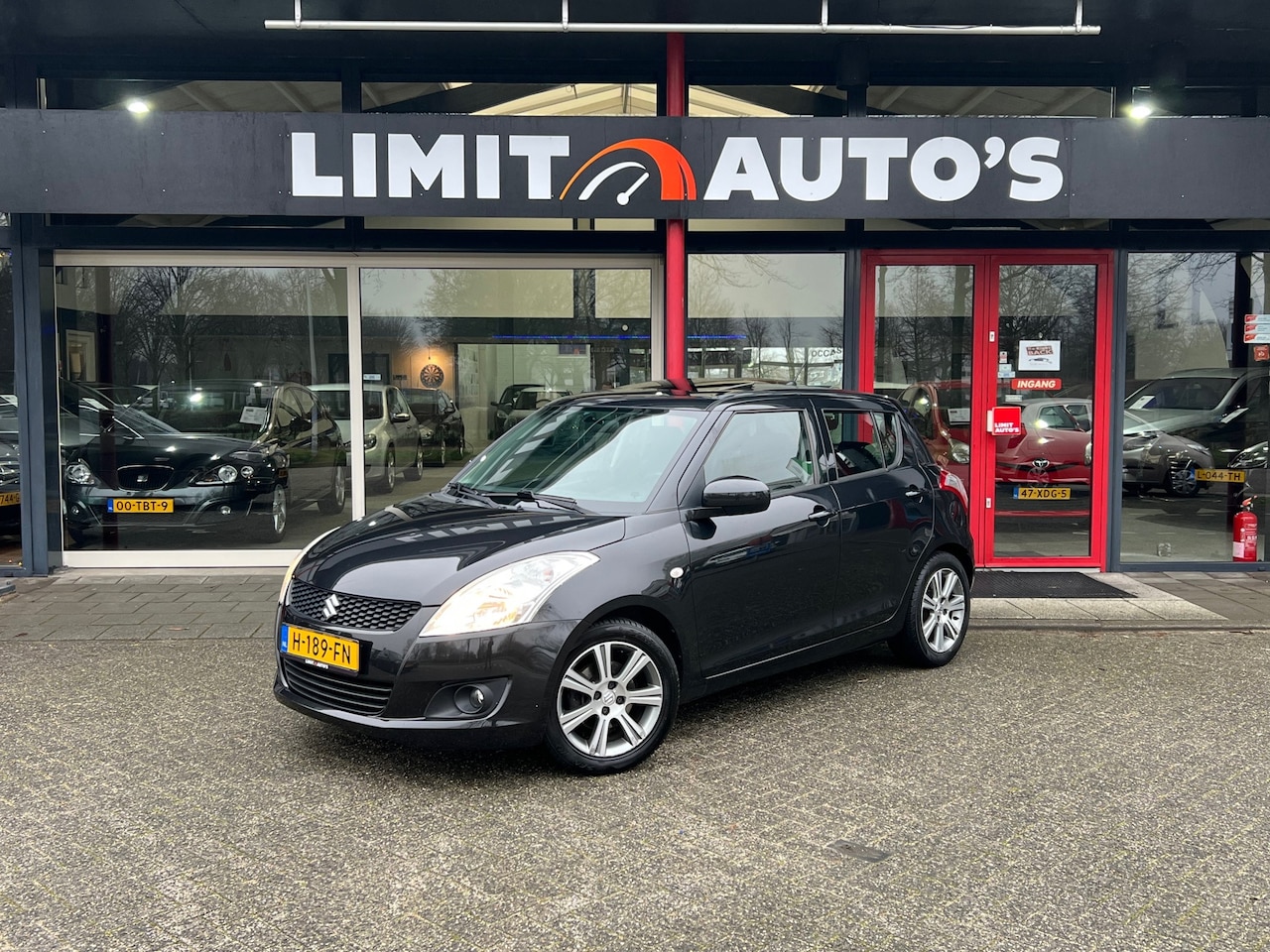 Suzuki Swift - 1.2 Exclusive Climate/Schuifdak/Cruise/St.verwarming/Keyless/Trekhaak/Apk - AutoWereld.nl