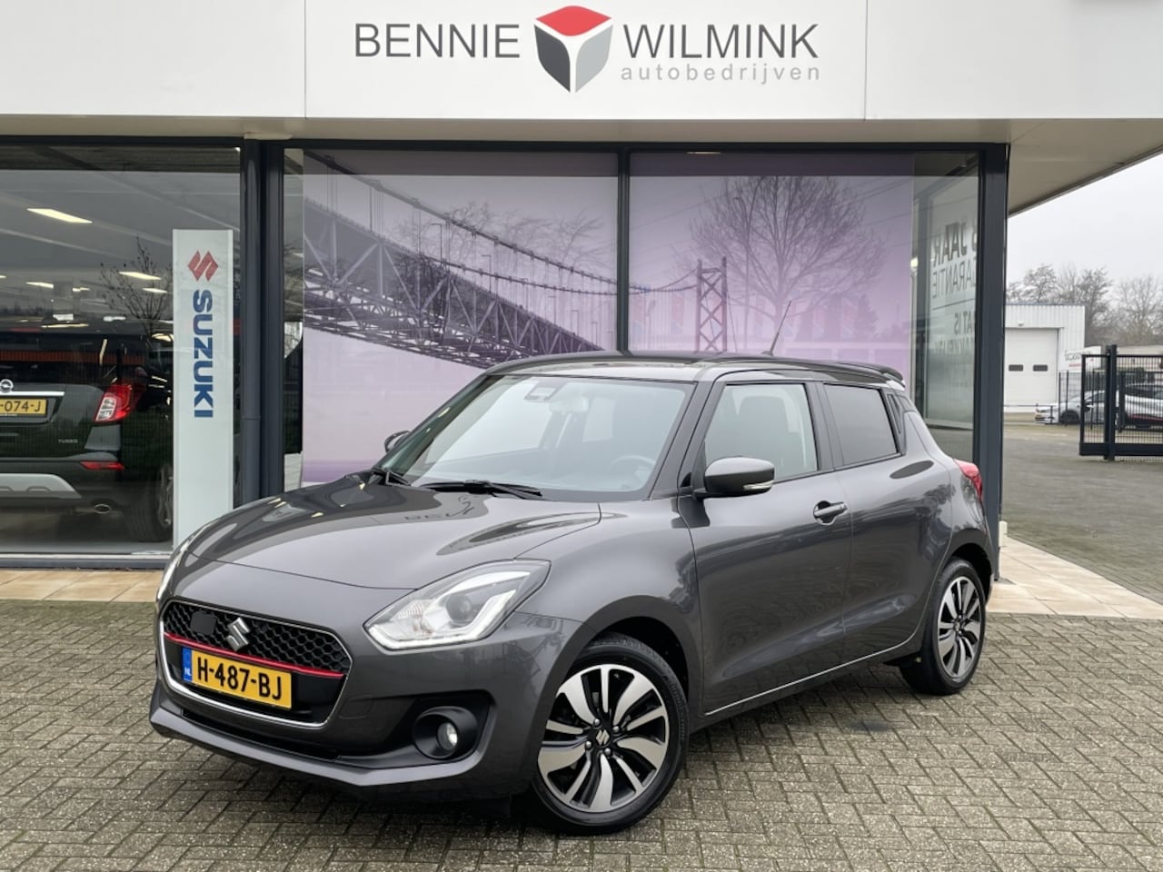 Suzuki Swift - 1.0 Boosterjet Stijl Smart Hybrid - AutoWereld.nl