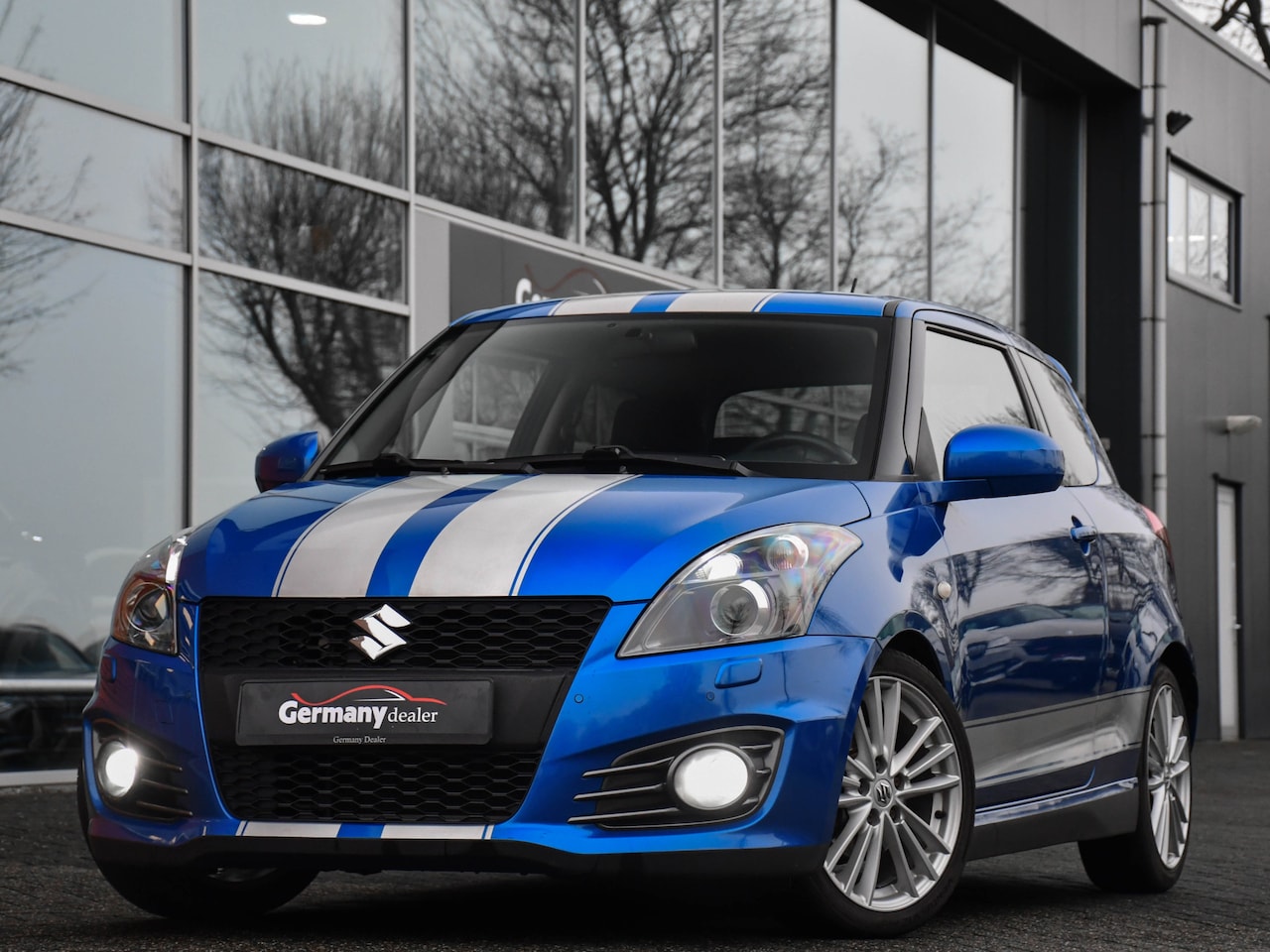 Suzuki Swift - 1.6 Sport Park.sensor V+A Carplay/Android Auto LED - AutoWereld.nl