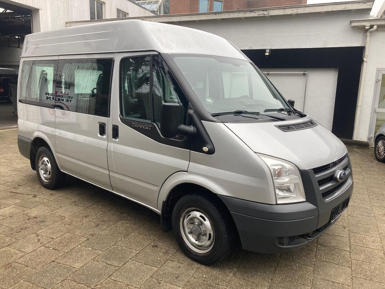 Ford Transit - Rolstoelbus rolstoel voorin side by side rolstoelauto - AutoWereld.nl