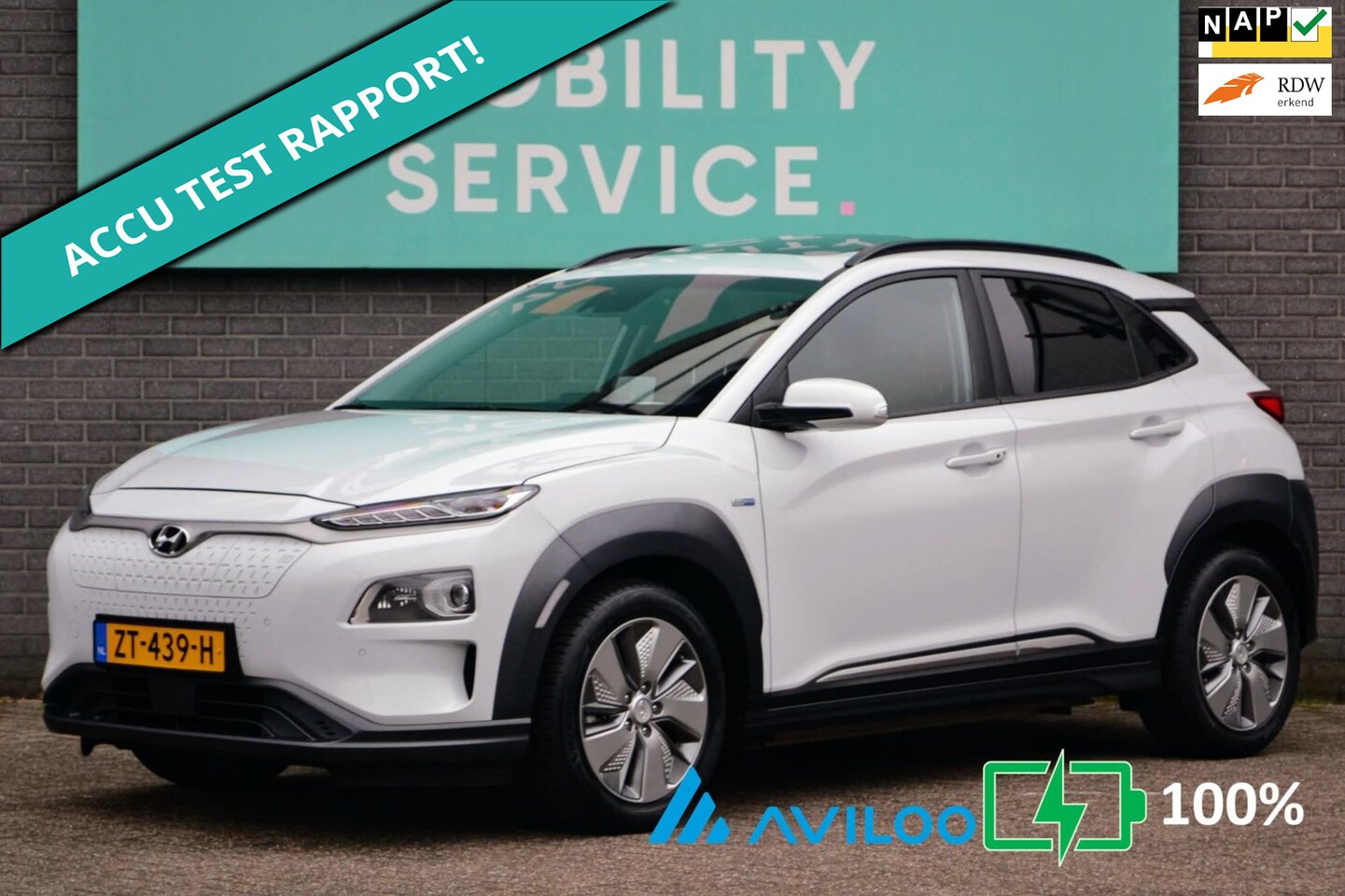 Hyundai Kona Electric - EV Premium 64 kWh SOH 100% SK-dak Leder ACC CarPlay - AutoWereld.nl