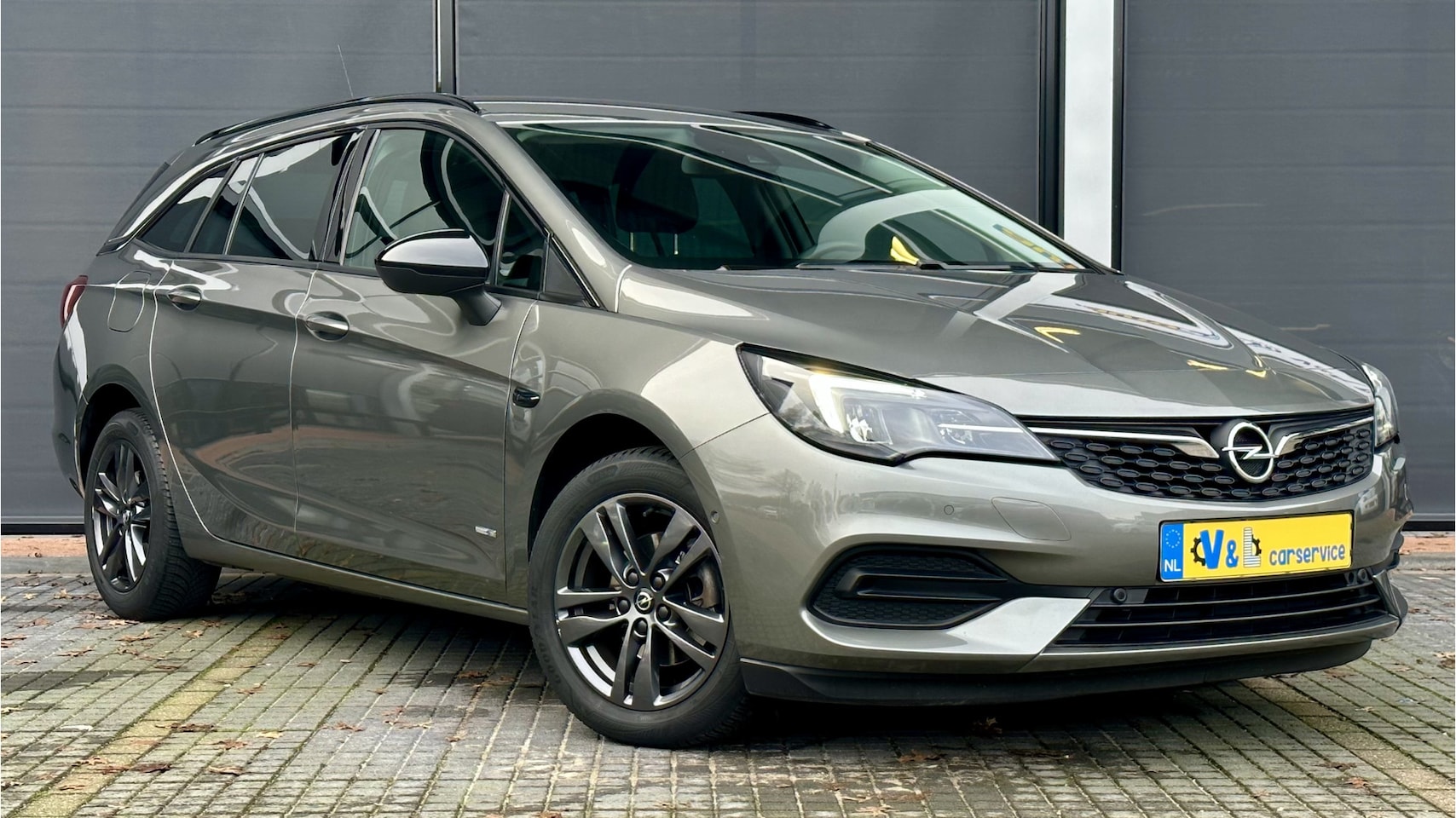 Opel Astra Sports Tourer - 1.2 Business Elegance / Carplay / Camera / PDC / Clima - AutoWereld.nl