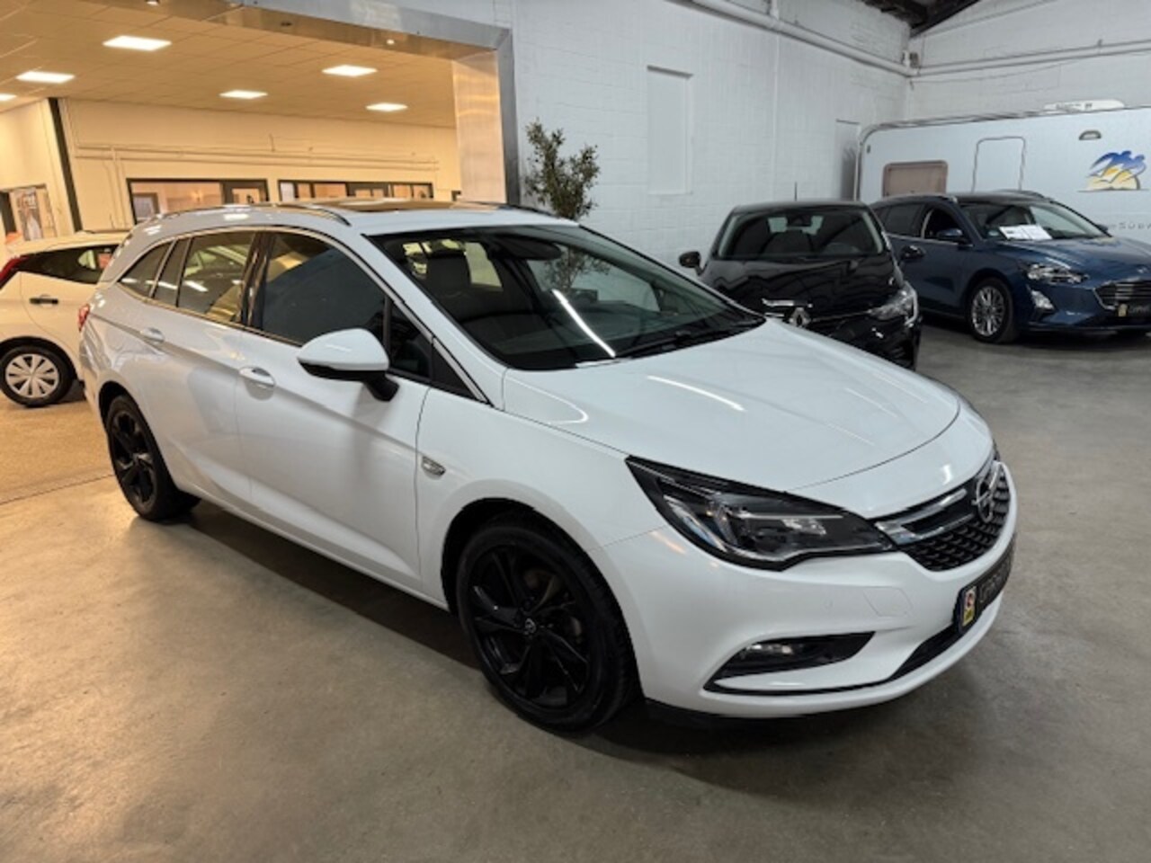 Opel Astra Sports Tourer - 1.0 T. Business Ex. - AutoWereld.nl