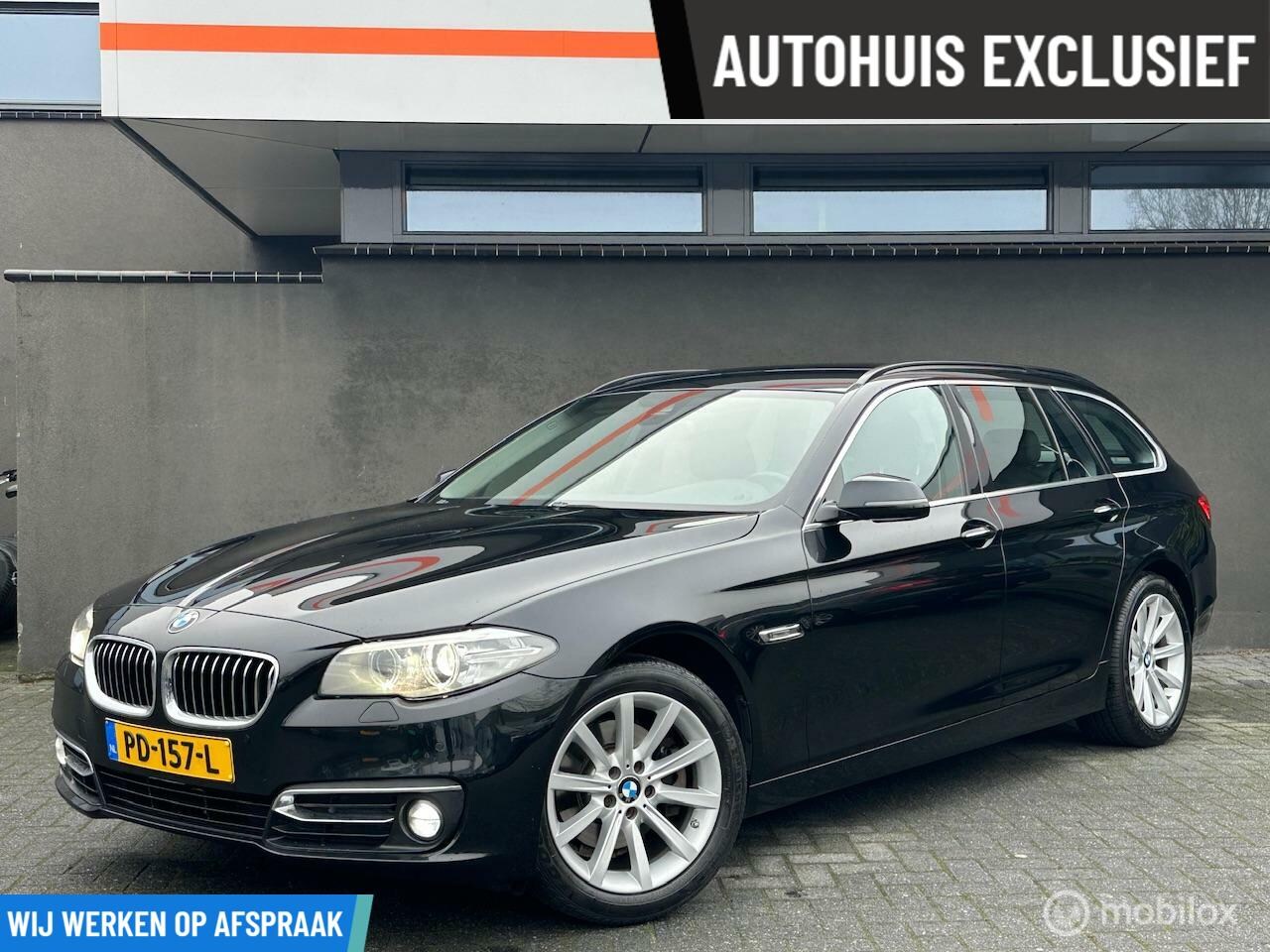 BMW 5-serie Touring - 520d Luxury Edition / 12 mnd garantie - AutoWereld.nl