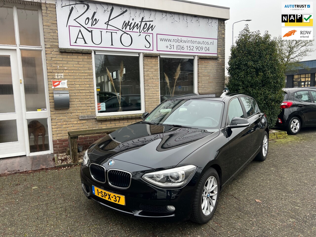 BMW 1-serie - 118d Executive Automaat / Leder / Navigatie - AutoWereld.nl