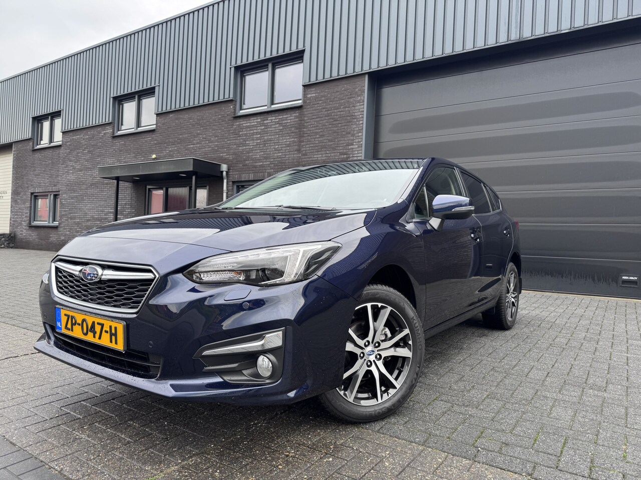 Subaru Impreza - 1.6i 4WD Comfort | 1E EIGENAAR| 12MND GARANTIE | AWD | CARPLAY | AUTOMAAT | - AutoWereld.nl