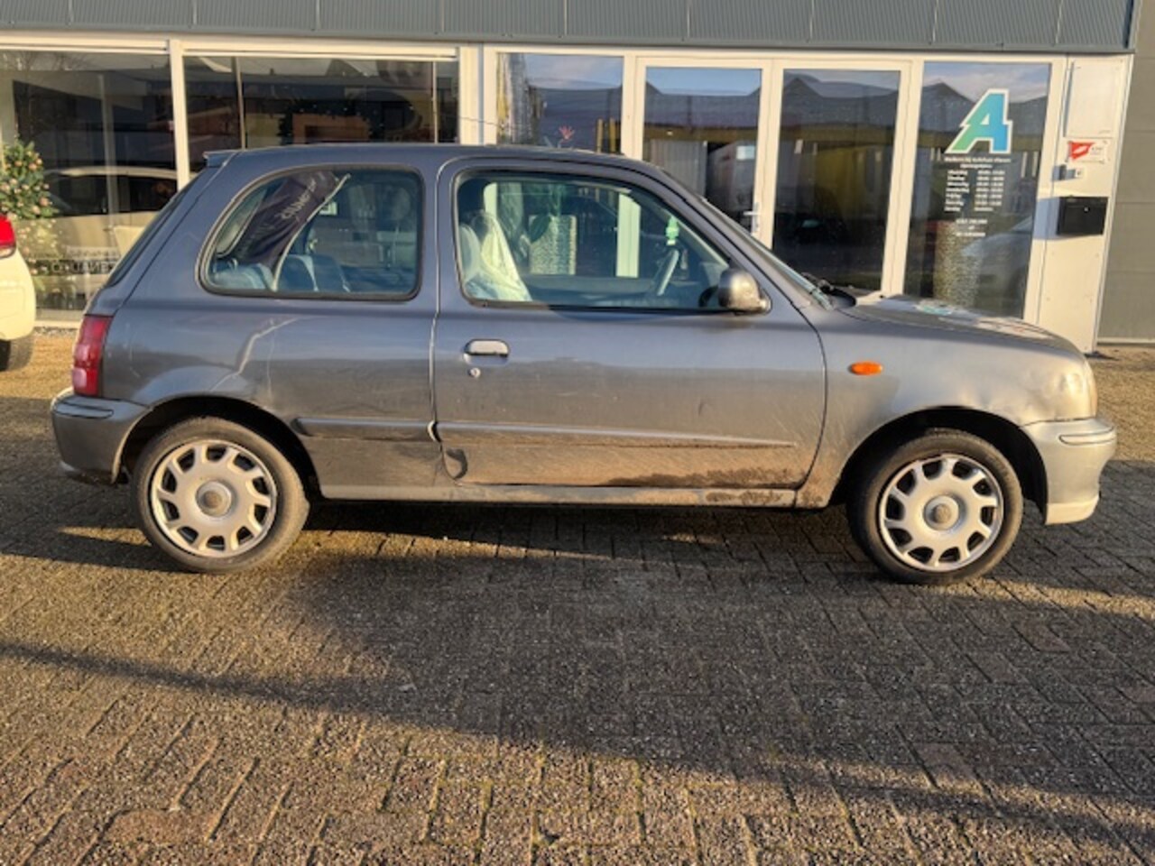 Nissan Micra - 1.4 Clair / Airco / Elektrische ramen - AutoWereld.nl