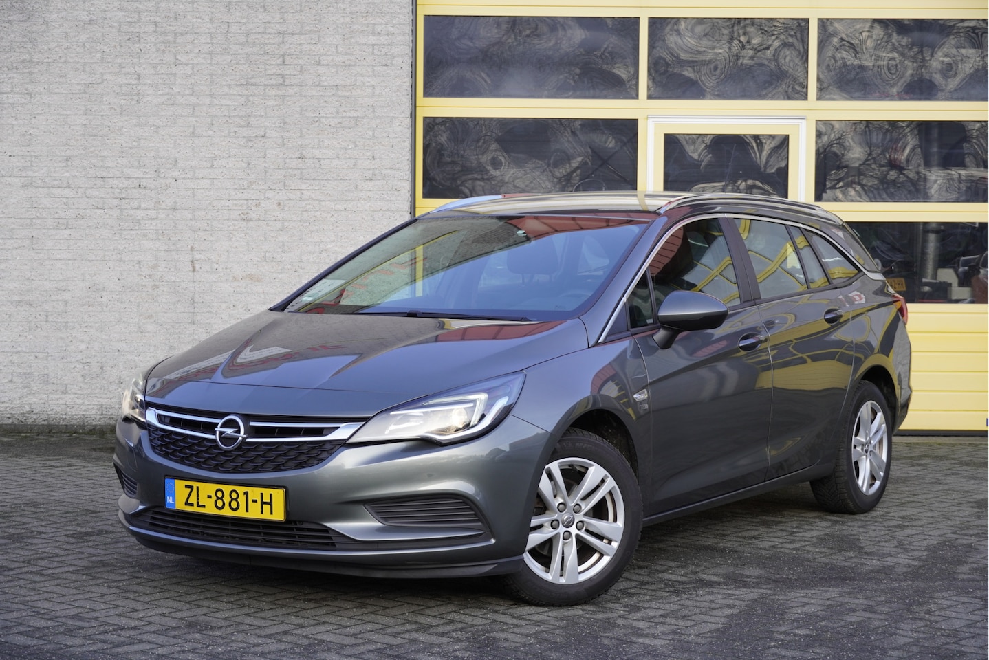 Opel Astra Sports Tourer - 1.4 Turbo 120 Jaar Edition BJ2019 Lmv 16" | Led | Navi | Trekhaak | Airco | Cruise control - AutoWereld.nl