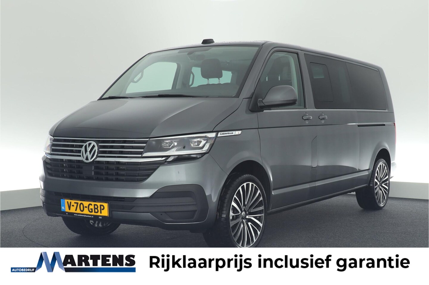 Volkswagen Transporter Caravelle - 2.0 TDI 204pk DSG L2H1 32 DC 2x Schuifdeur Leder Stoelverwarming Virtual Cockpit Navigatie - AutoWereld.nl