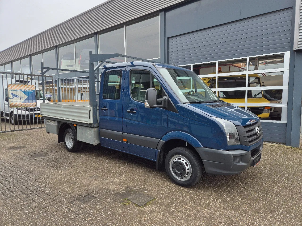 Volkswagen Crafter - 46 2.0 TDI DoKA 6 Sitze/ Pritsche/ Airco - AutoWereld.nl