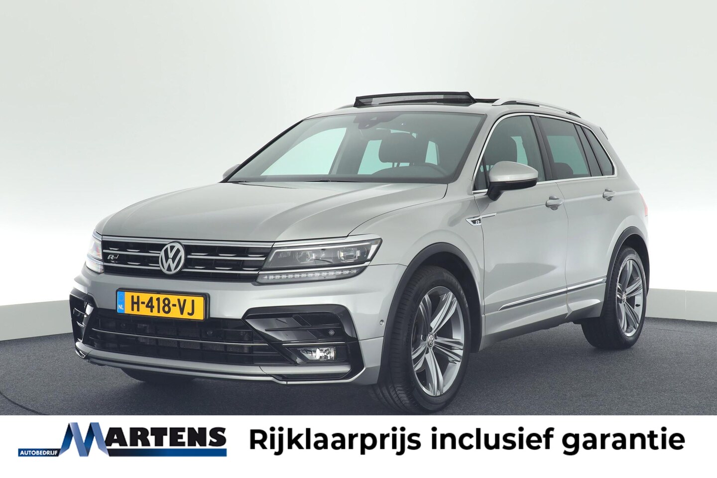 Volkswagen Tiguan - 1.5 TSI 150pk ACT DSG R-Line Highline Panoramadak Trekhaak Virtual Cockpit Camera Navigati - AutoWereld.nl