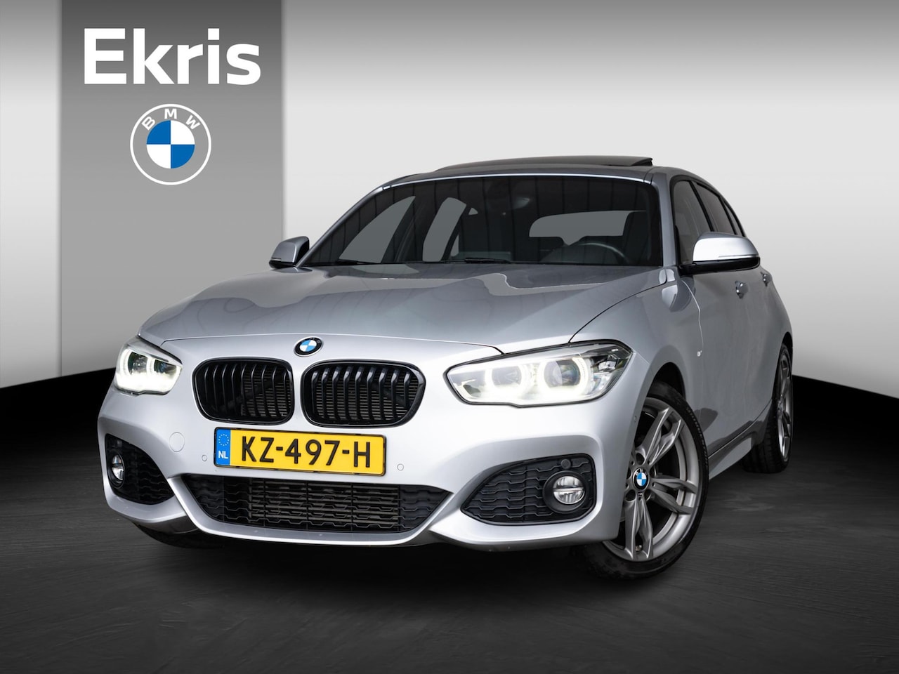 BMW 1-serie - 118i M Sport +  High Executive + Panoramadak - AutoWereld.nl