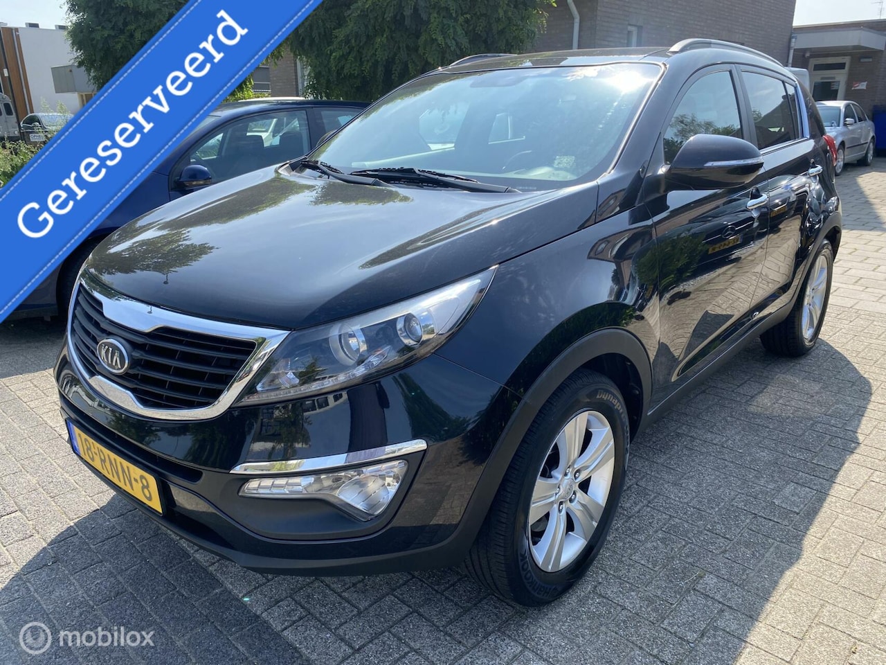 Kia Sportage - 1.6 GDI ISG X-ecutive Plus Pack 263.DKM ECC NAVIPANO CRUISE TREKHAAK - AutoWereld.nl