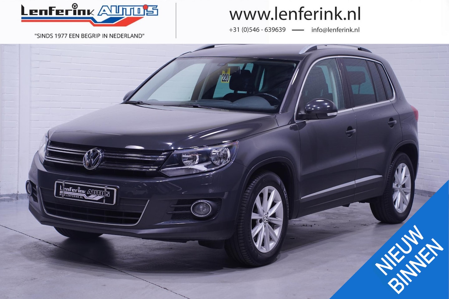 Volkswagen Tiguan - 1.4 TSI Sport&Style Navi Stoelverwarming Cruise - AutoWereld.nl