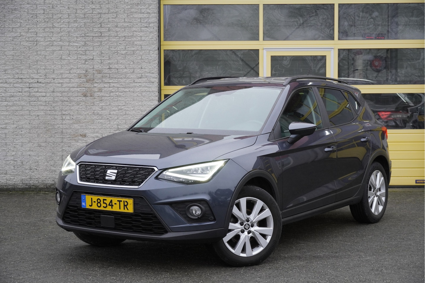 Seat Arona - 1.0 TSI Style Limited Edition BJ2020 Lmv 17" | Led | Pdc | Navi | Trekhaak | Keyless entry - AutoWereld.nl